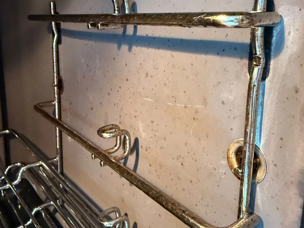 Cleaned chrome oven shelf rails