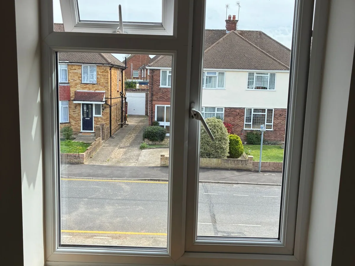 Streak-free interior window with a clear street view after cleaning